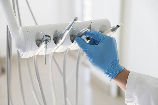 Professional Tooth Extraction technician working in Miami Lakes, FL
